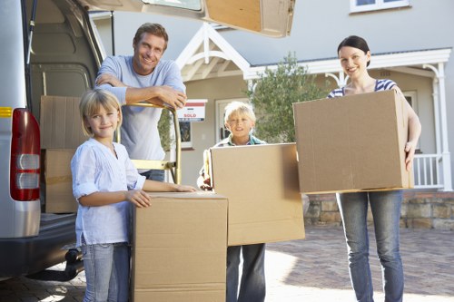 Packed boxes and household items ready for transport in Merton