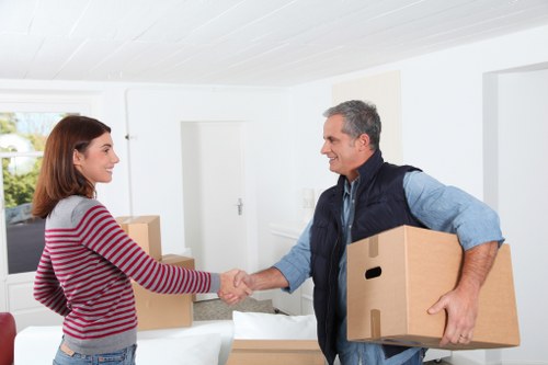 Packed boxes and furniture ready for collection in Merton