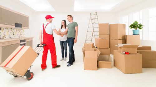 Careful handling of boxes and household items during a Merton move