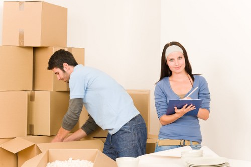 Loading household furniture into a removal van