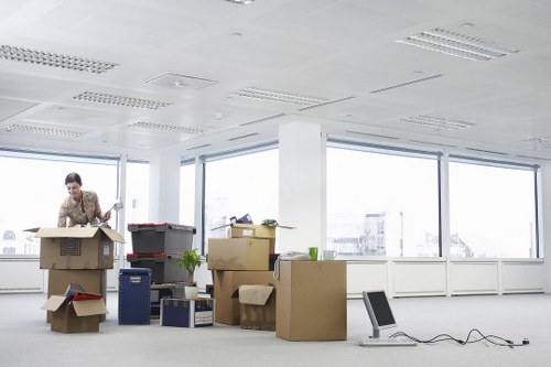 Careful loading of office furniture and IT equipment for a Merton business move