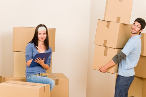 Prepared boxes and furniture ready for a removals van in Merton